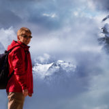 Frau mit Rucksack vor dem Großglockner